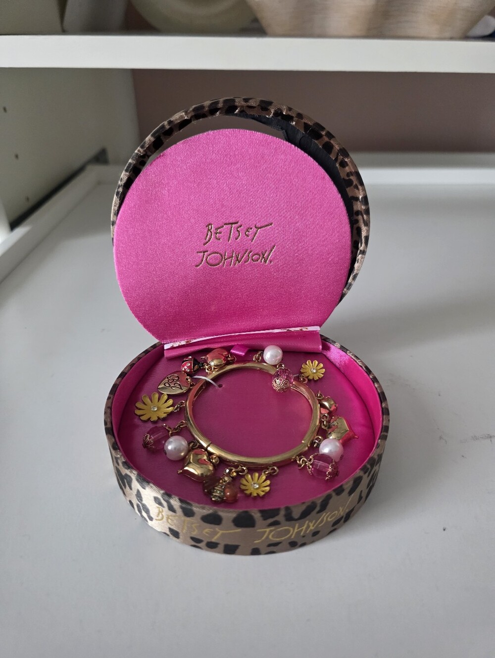Betsey Johnson Gold Bracelet with Pink Pearls and Yellow Flower Charms